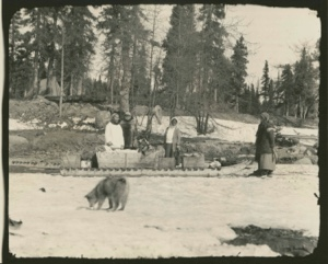 Image of Eskimos [Inuit] visiting at station